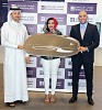 Emirates Islamic hands over Tesla to Kunooz Account winner