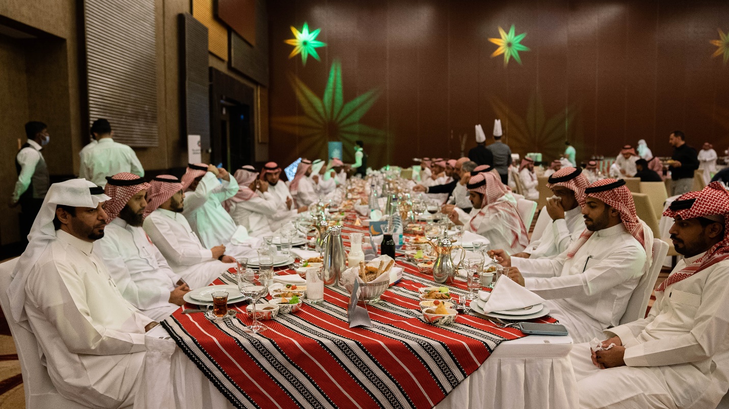 A picture containing table, indoor, family, several

Description automatically generated