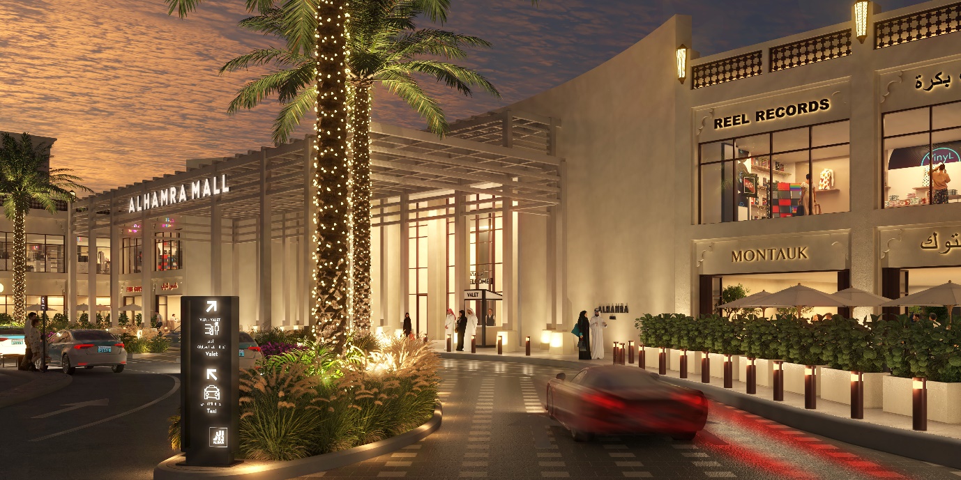 A building with palm trees and cars

Description automatically generated