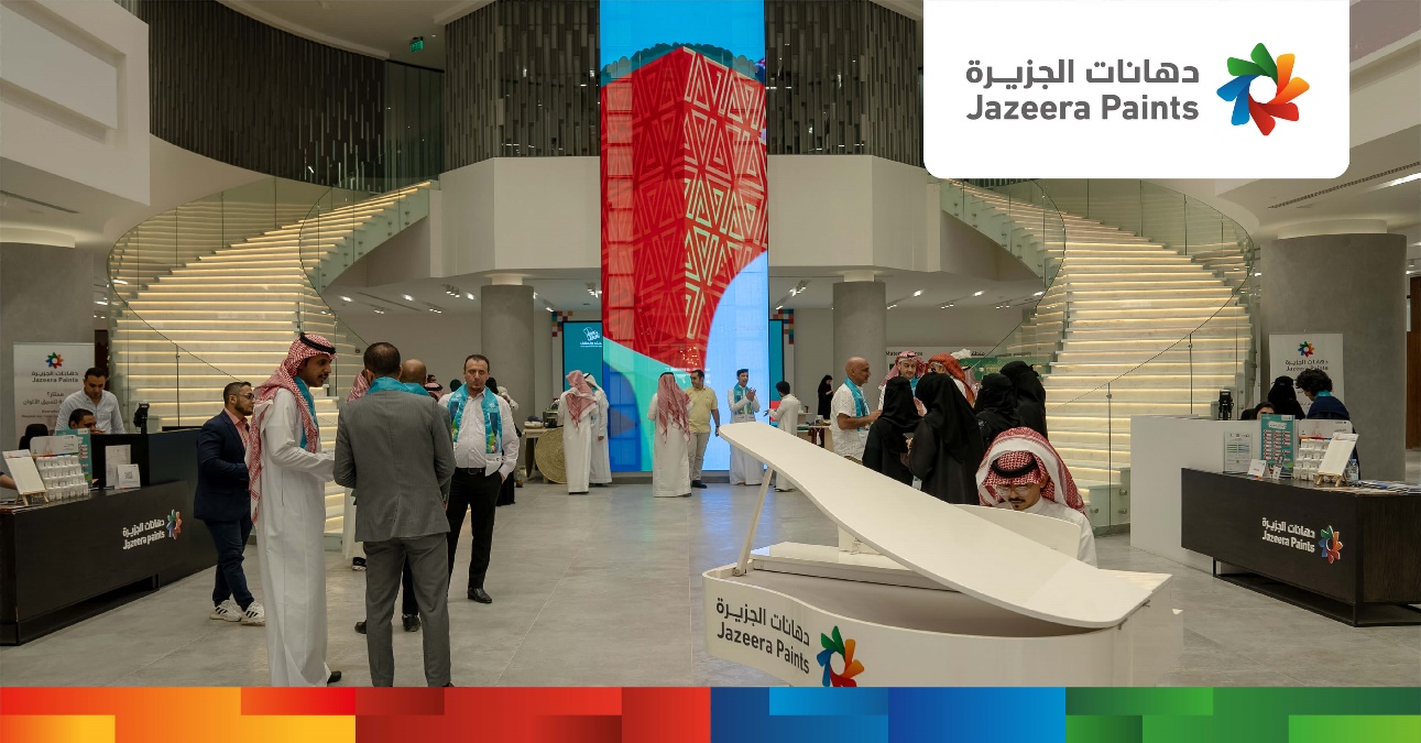 A group of people in a building

Description automatically generated